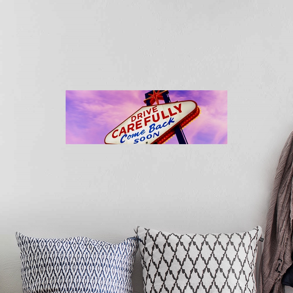 A bohemian room featuring Panoramic photo on canvas of a come back soon sign in Las Vegas.