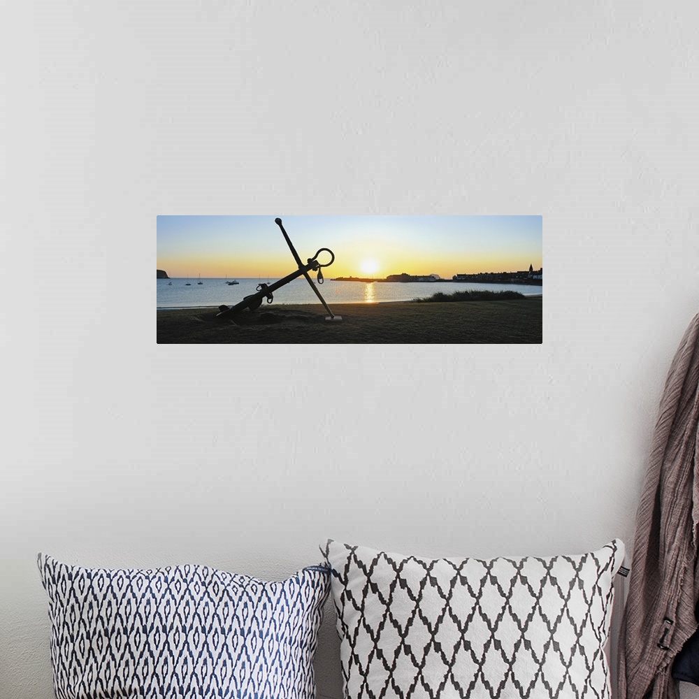 A bohemian room featuring Silhouette of an anchor on the beach at sunrise, North Berwick, East Lothian, Scotland