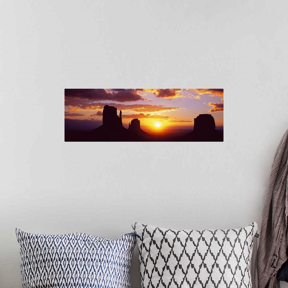 A bohemian room featuring Silhouette of buttes at sunset, Monument Valley, Utah, USA