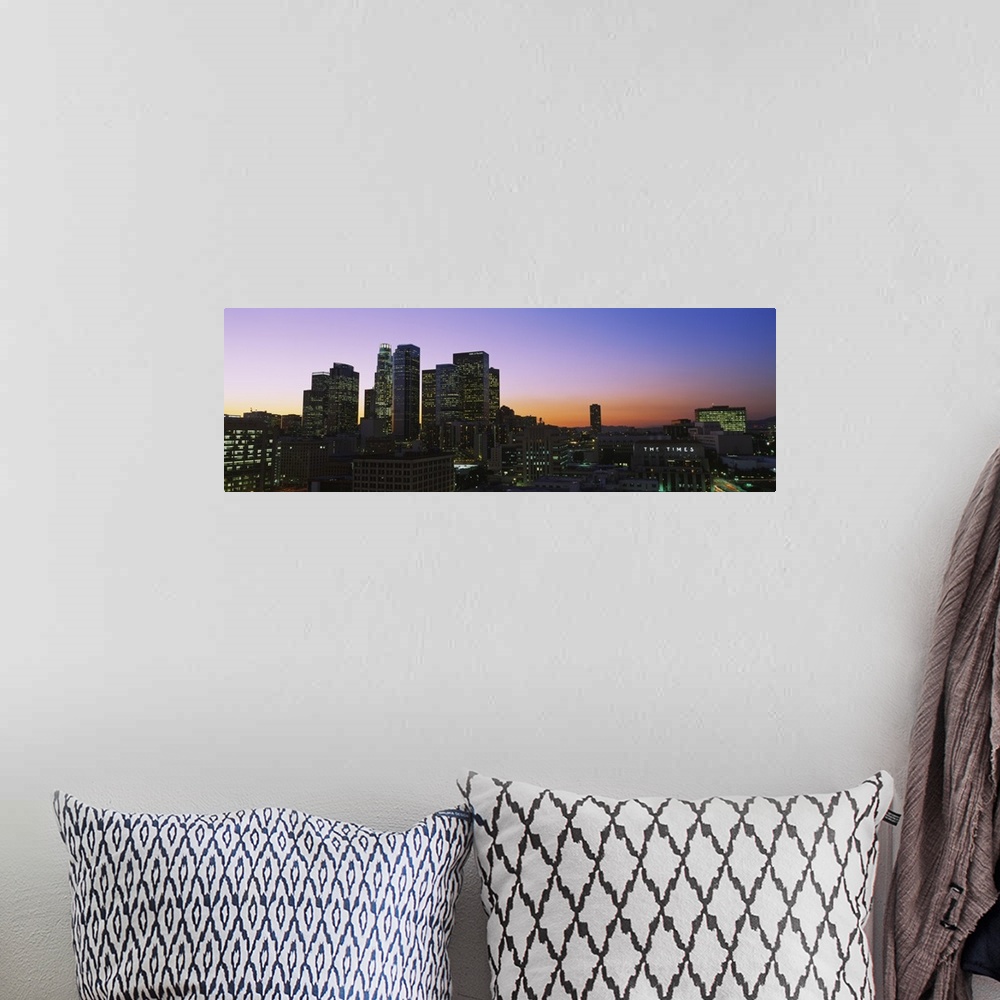 A bohemian room featuring Silhouette of skyscrapers at dusk, City of Los Angeles, California