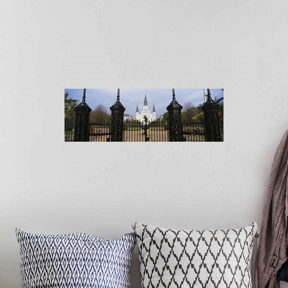 A bohemian room featuring Panoramic photo on canvas of a big house of worship that is seen through iron fences located in L...