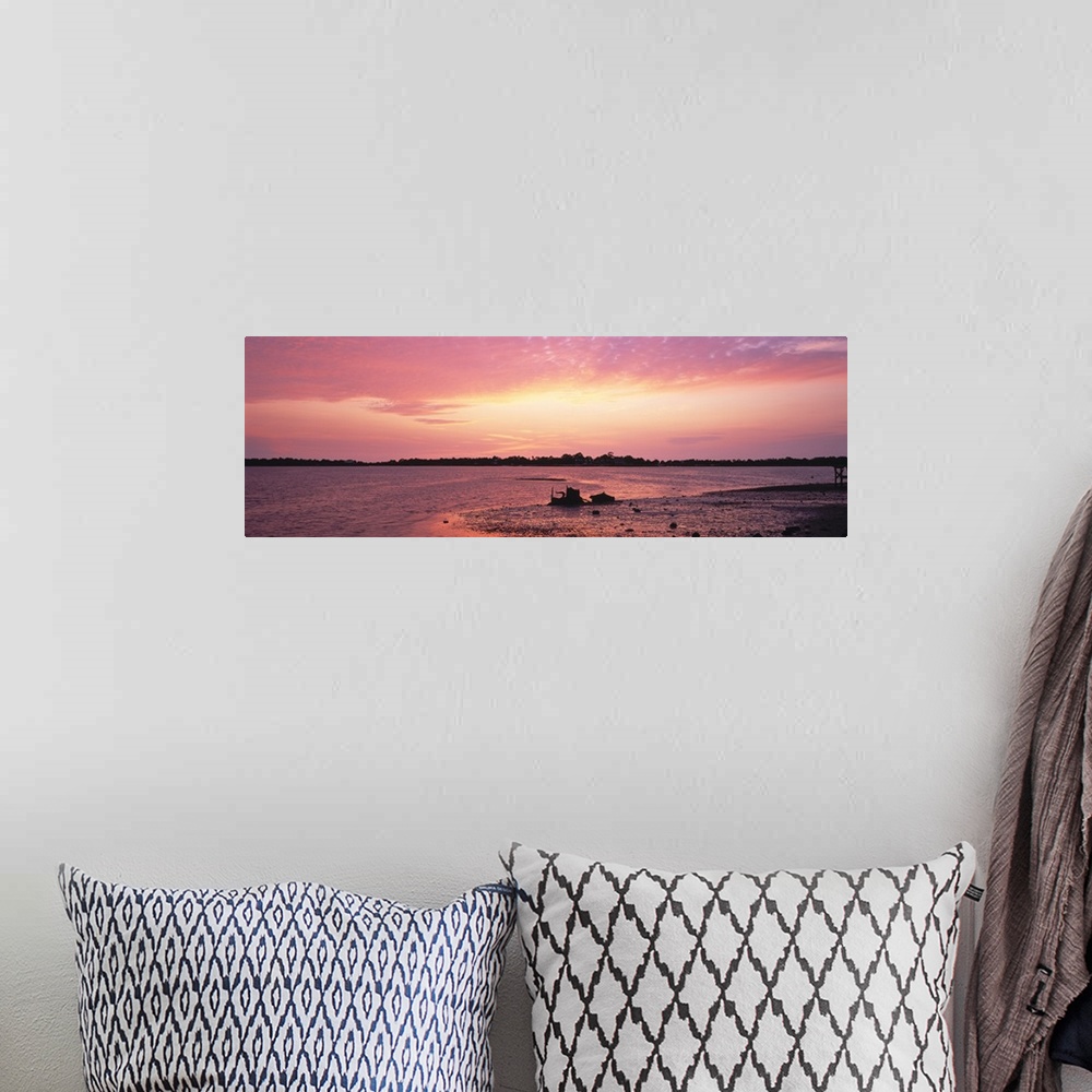 A bohemian room featuring Sunset over the sea, Gulf of Mexico, Cedar Key, Florida