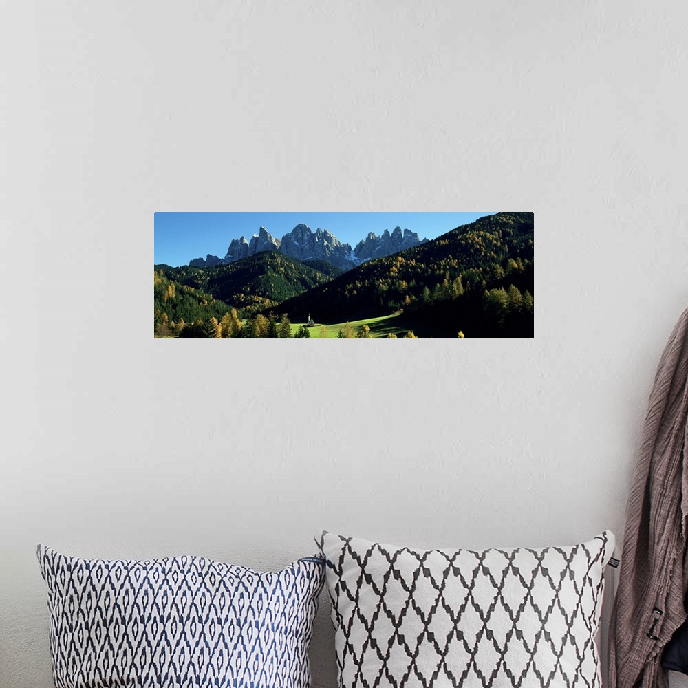 A bohemian room featuring Trees on a landscape, Dolomites, Funes Valley, Le Odle, Santa Maddalena, Tyrol, Italy