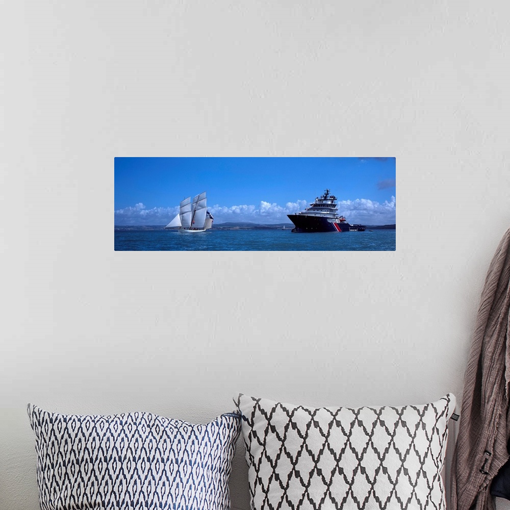 A bohemian room featuring Tugboat Abeille Bourbon and tall ship Granvillaise in the sea, Baie De Douarnenez, Finistere, Bri...
