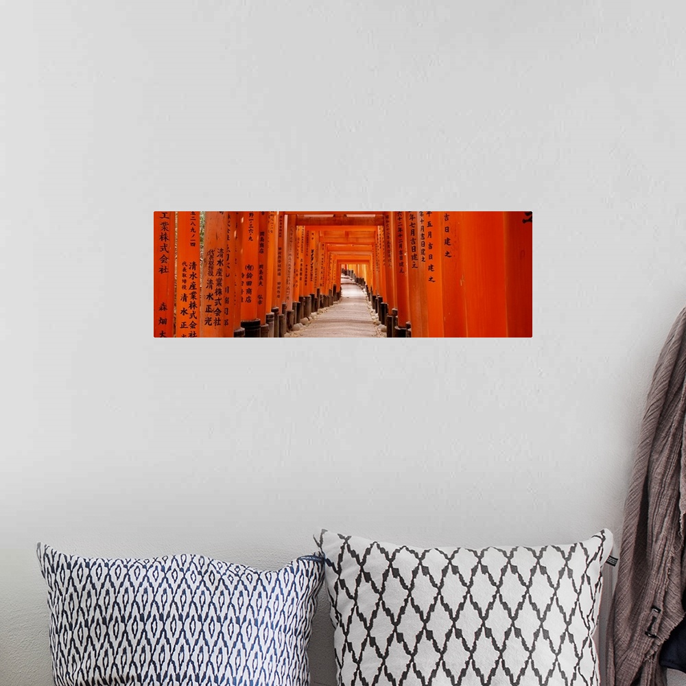 A bohemian room featuring Panoramic photo on canvas of the orange Japanese gates with Japanese writing on them that form a ...