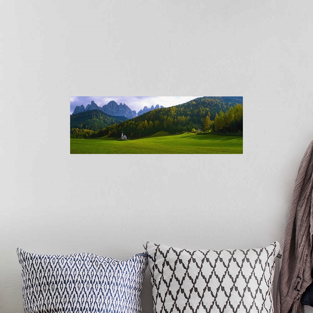 A bohemian room featuring Valley with a church and mountains in the background, Santa Maddalena, Val De Funes, Le Odle, Dol...