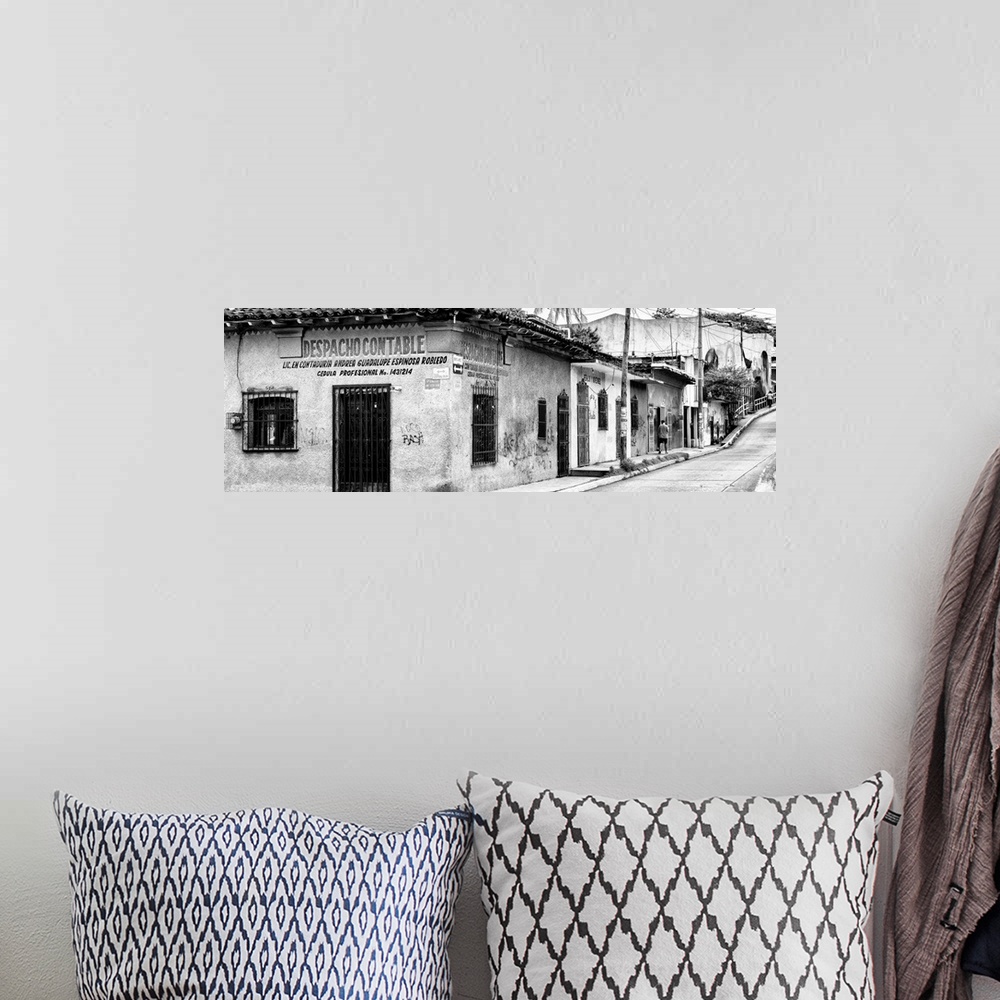 A bohemian room featuring Black and white panoramic photograph of an urban street in Mexico. From the Viva Mexico Panoramic...