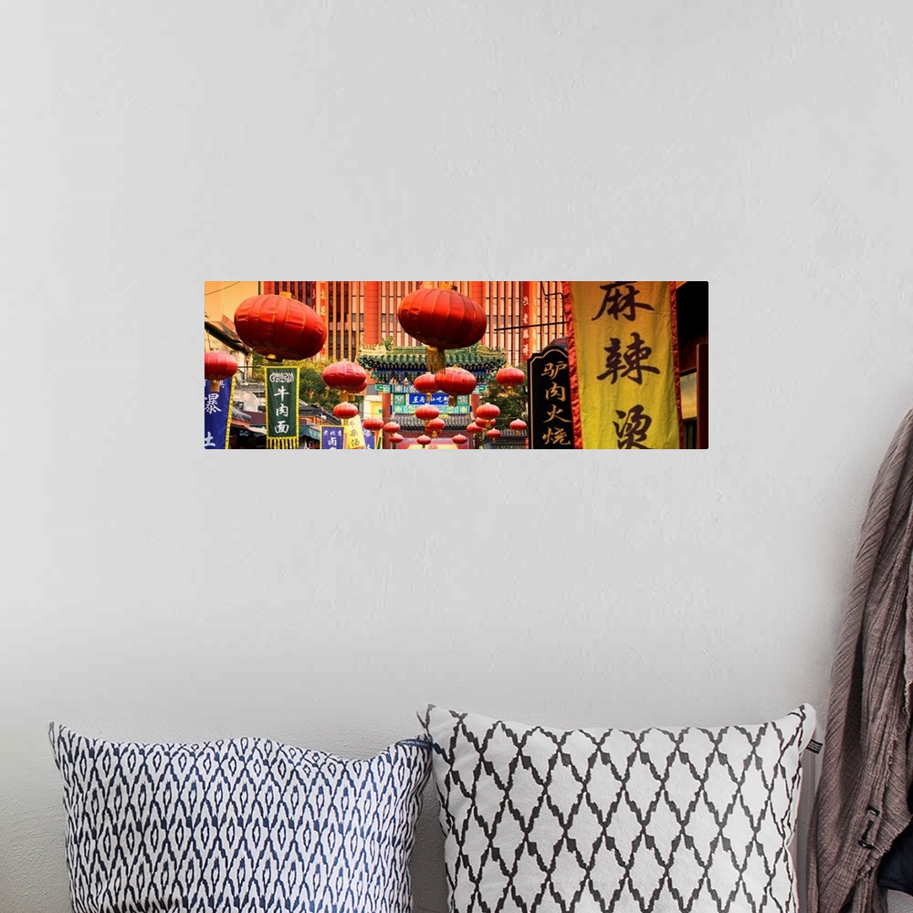 A bohemian room featuring Red Lanterns, China 10MKm2 Collection.