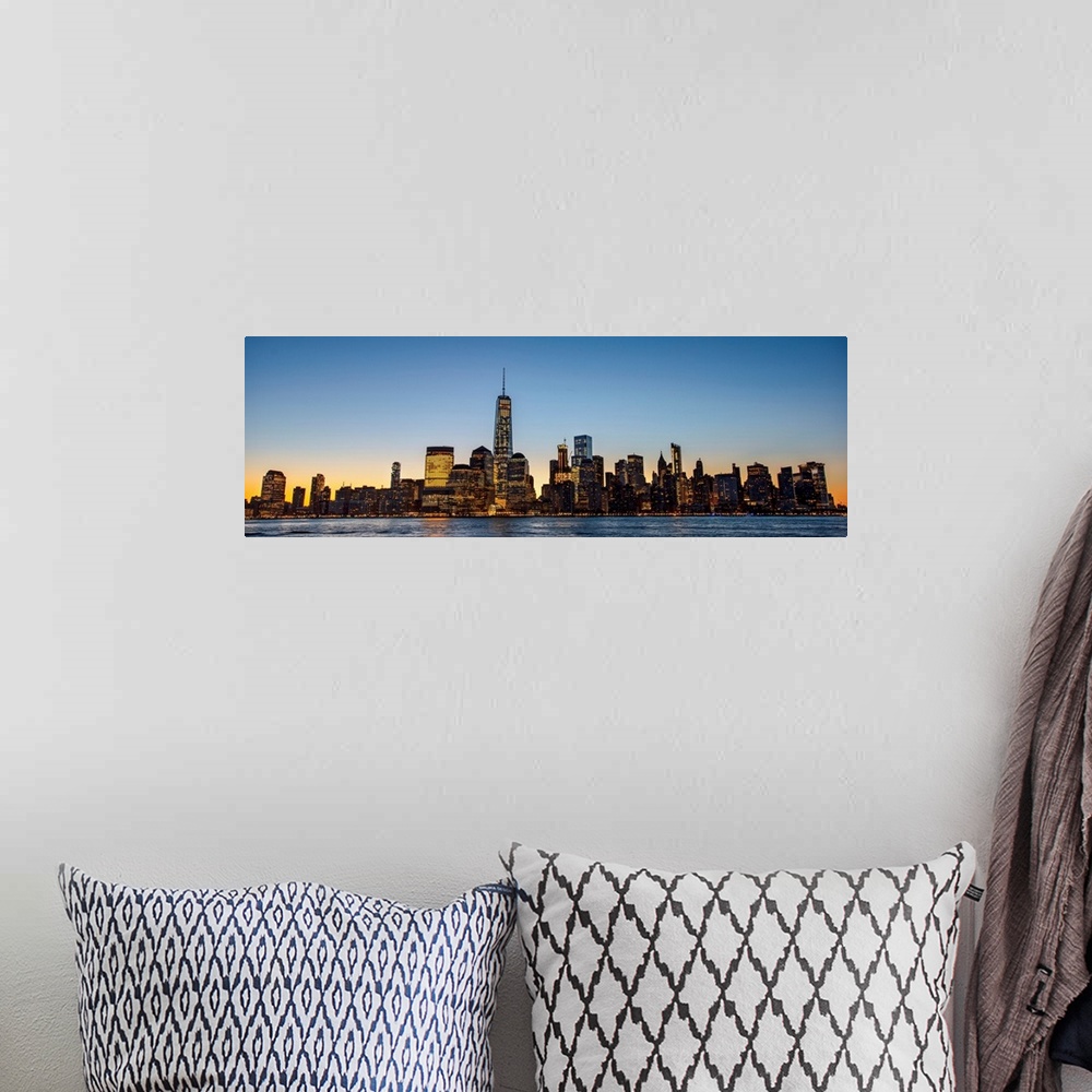 A bohemian room featuring Panoramic view of the New York City skyline over Manhattan in the morning.