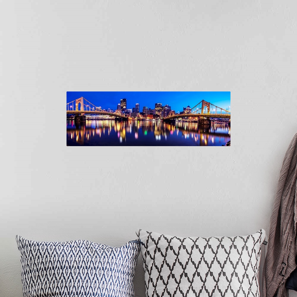 A bohemian room featuring Panoramic photo of downtown Pittsburgh at night with the Rachel Carson Bridge and the Andy Warhol...