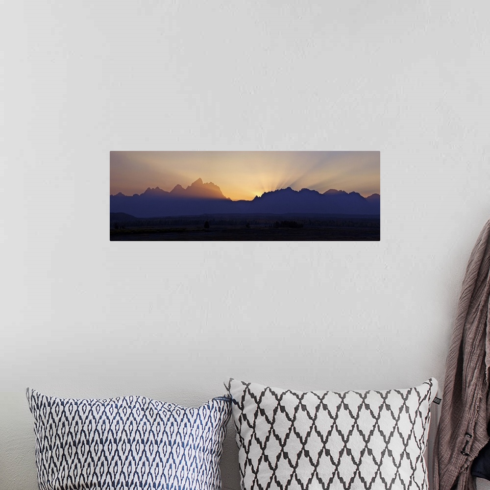 A bohemian room featuring Sunset over the Cathedral Group of mountains, Grand Teton National Park, Wyoming