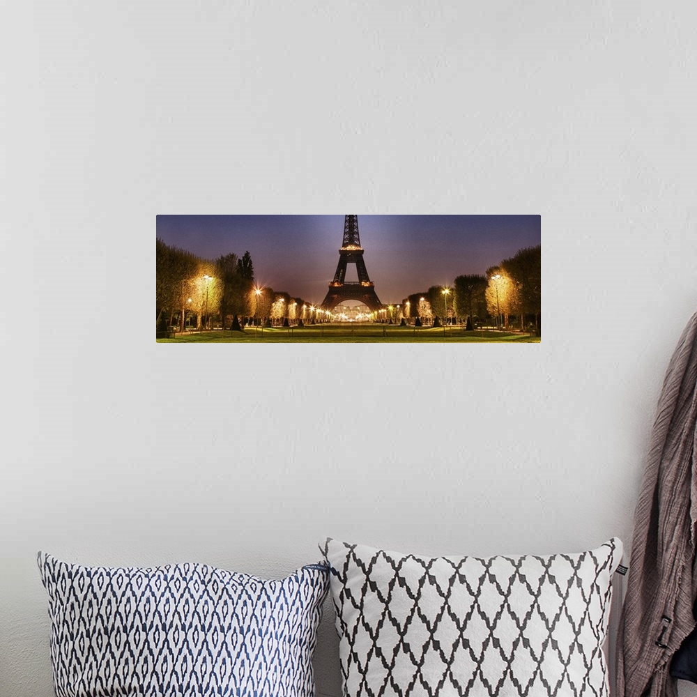 A bohemian room featuring The Eiffel Tower in Paris at night