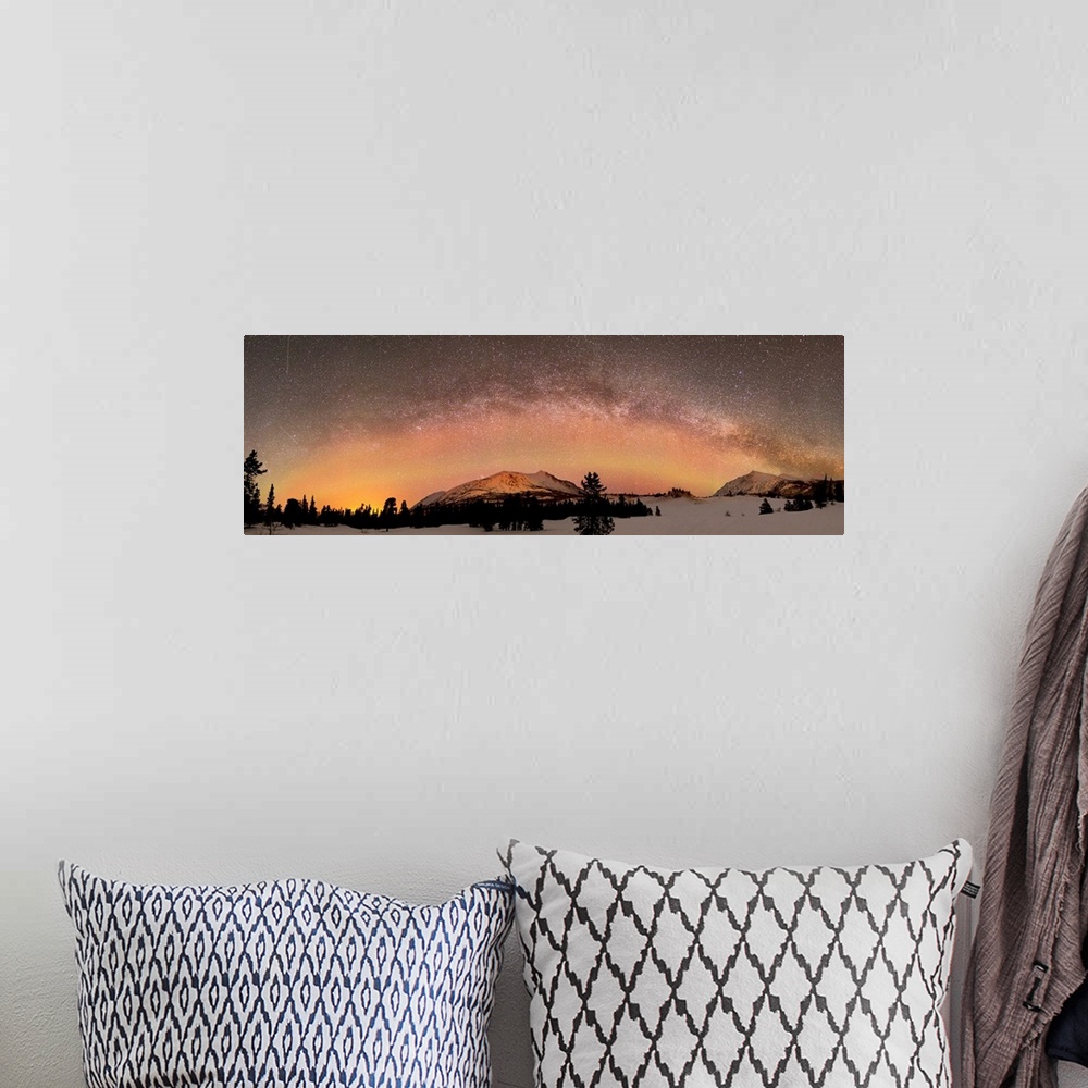 A bohemian room featuring Aurora borealis and Milky Way over Carcross Desert, Carcross, Yukon, Canada.
