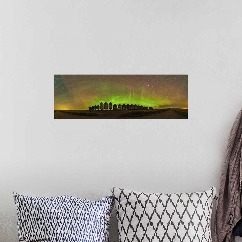 A bohemian room featuring A 180 degree panorama of a modest aurora display behind grain bins on a country road in Alberta, ...