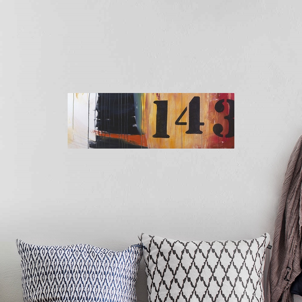 A bohemian room featuring Contemporary abstract painting using stenciled numbers against a patches of muted colors.