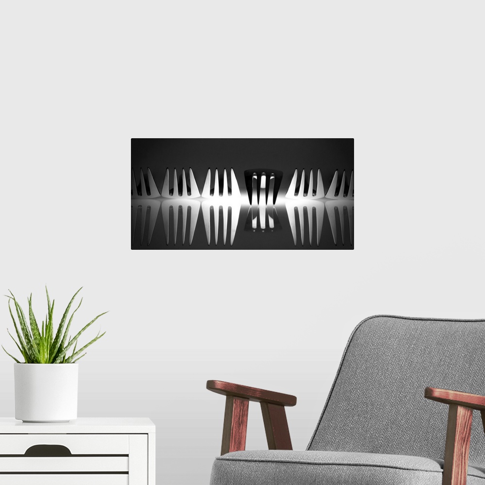 A modern room featuring Abstract image of a row of forks with light reflecting from below with one turned upside down.