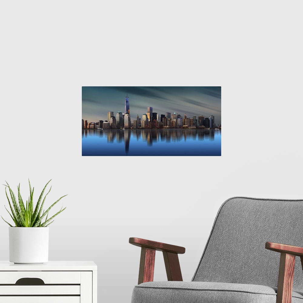 A modern room featuring Manhattan skyline with the One World Trade Center building standing tall.