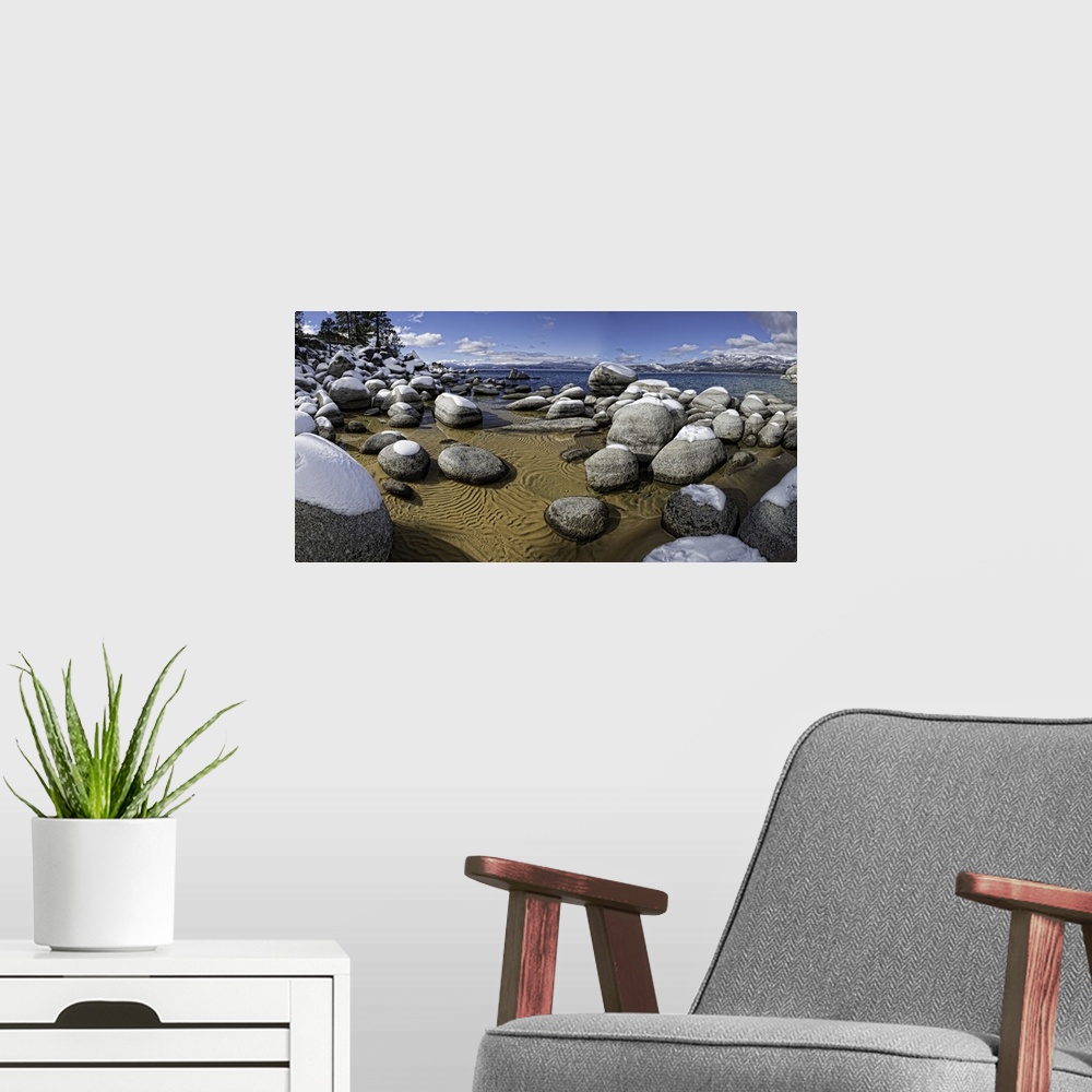A modern room featuring This is a panoramic capture of Snow-covered boulders in Lake Tahoe's Sand Harbor, California, USA.