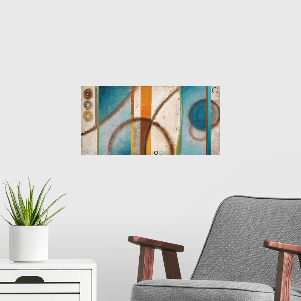 A modern room featuring Contemporary abstract home decor artwork using cool tones.