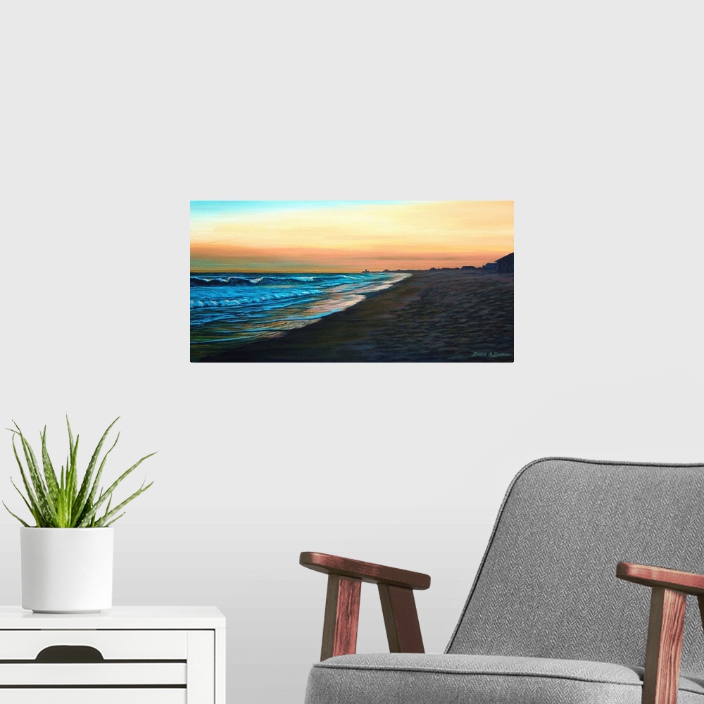 A modern room featuring Contemporary painting of beach and water scene at sunset.