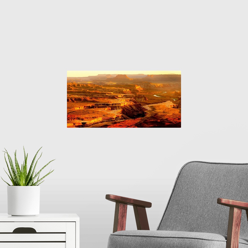 A modern room featuring Grand Canyon, sunlight, color photograph