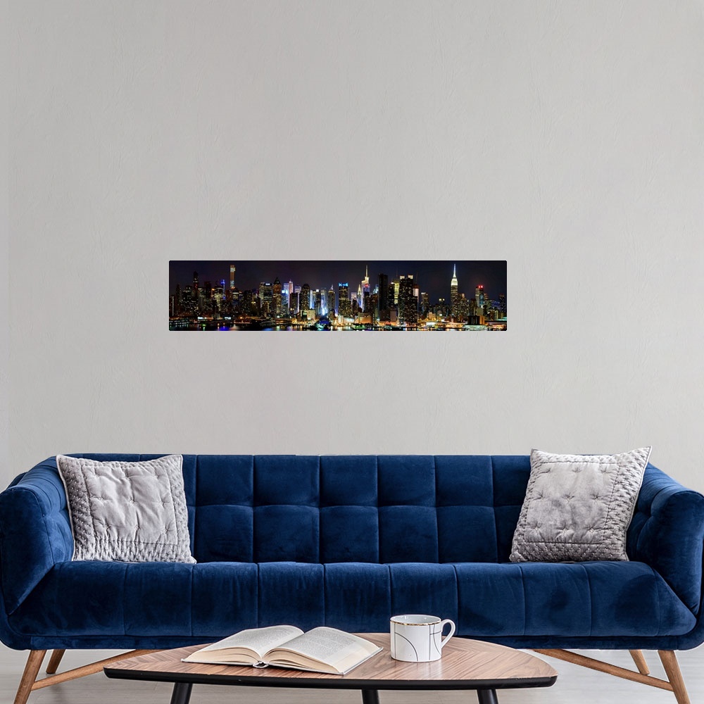 A modern room featuring Manhattan Panoramic View At Night