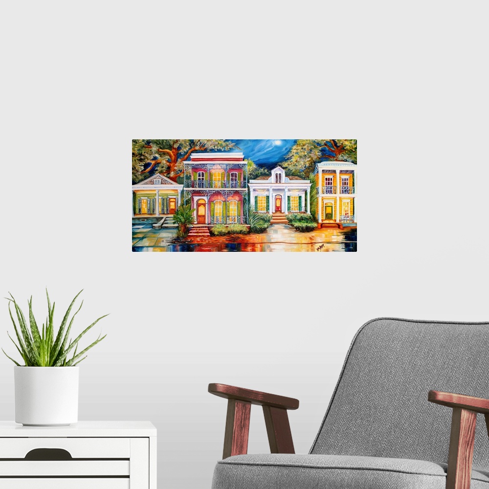 A modern room featuring Vibrant painting of a row of home facades in New Orleans, LA.
