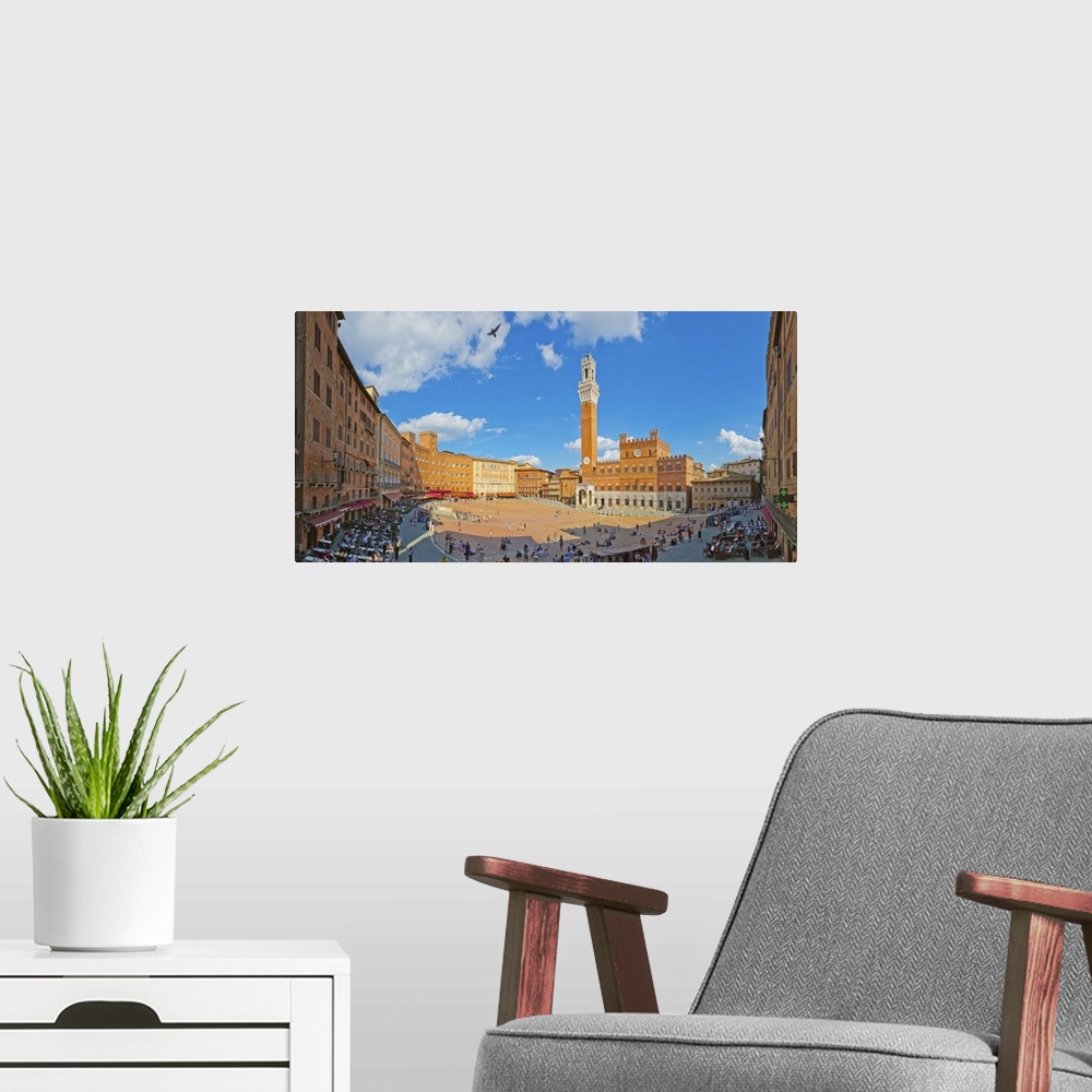 A modern room featuring Italy, Tuscany, Siena district, Siena, Piazza del Campo, Palazzo Pubblico and Torre del Mangia.