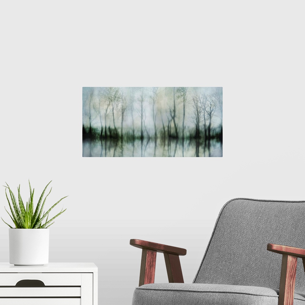 A modern room featuring Contemporary artwork of shadowy bare trees at the edge of a pond.