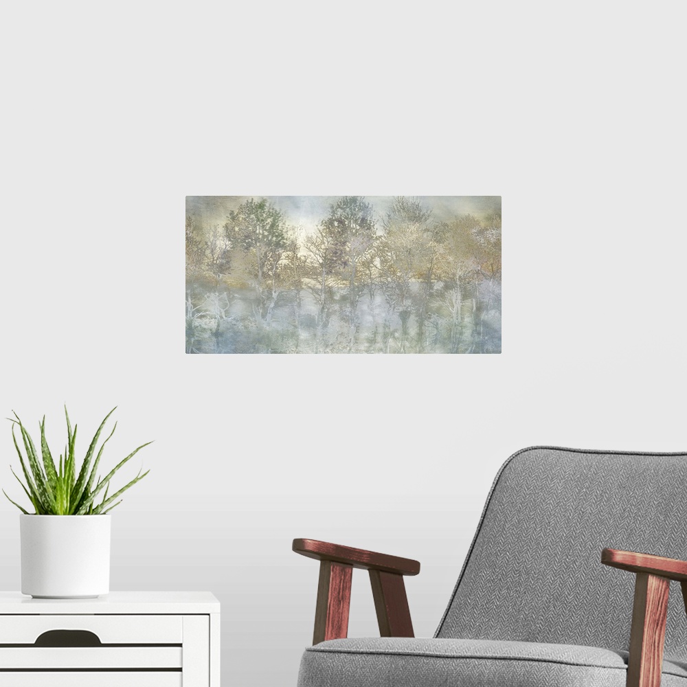 A modern room featuring Semi-abstract artwork of a forest of misty trees in shades of pale brown and blue.