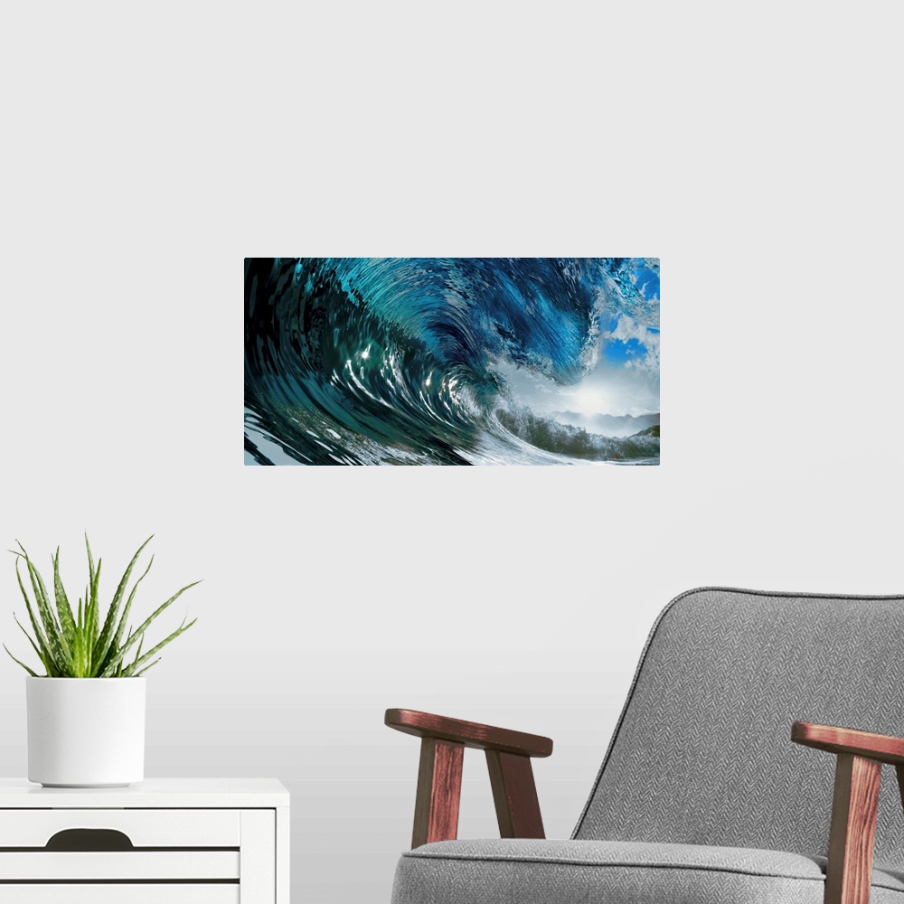 A modern room featuring Panoramic photo of the inside of a large wave in the ocean before it breaks.