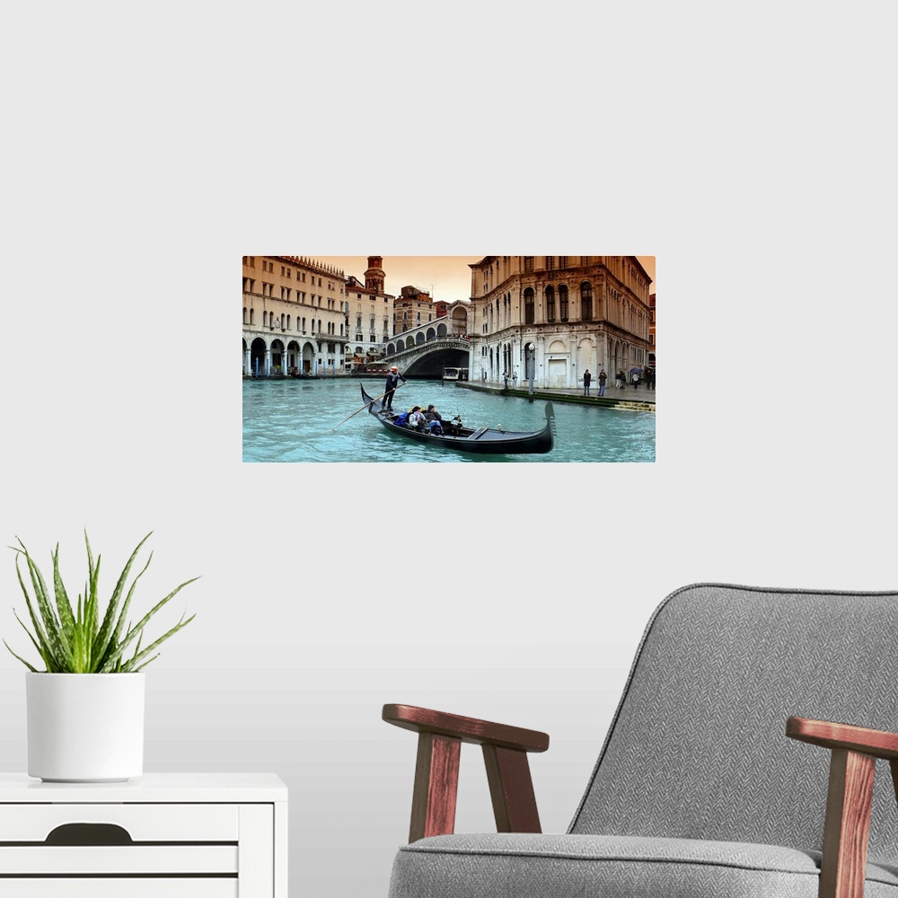 A modern room featuring Panoramic image of a couple riding in a gondola in the canals of Venice, Italy.