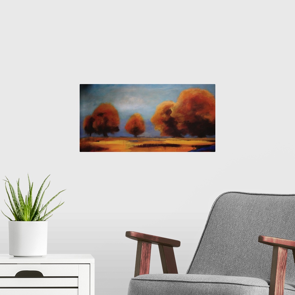 A modern room featuring Contemporary artwork of brightly colored fall trees against a shaded blue sky.