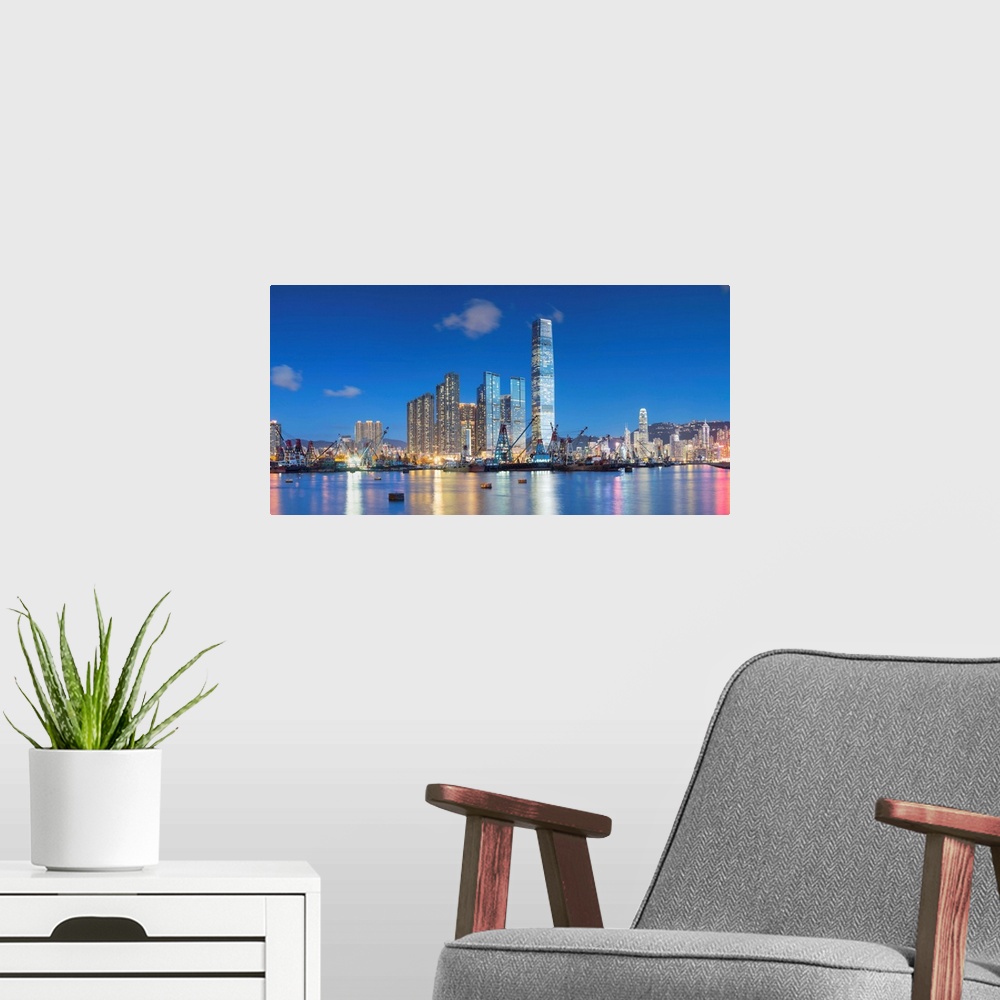 A modern room featuring International Commerce Centre (ICC) and Yau Ma Tei Typhoon Shelter at dusk, West Kowloon, Hong Ko...