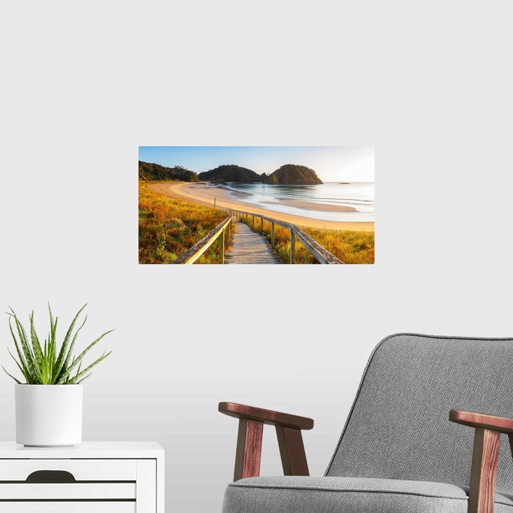 A modern room featuring Matapouri Beach at sunrise, Tutukaka Coast, Northland, North Island, New Zealand