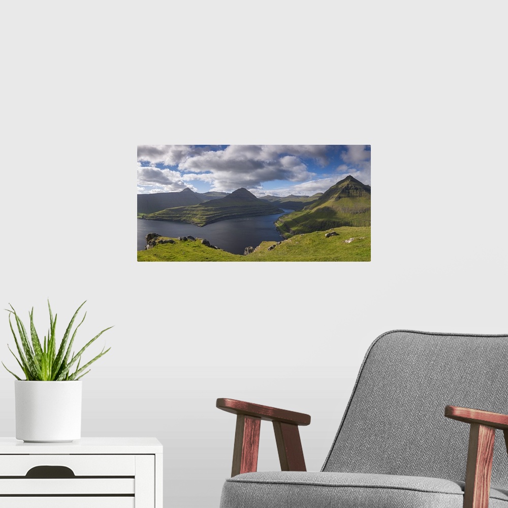 A modern room featuring Mountains surrounding Funningsfjordur on the island of Eysturoy, Faroe Islands, Denmark. Summer (...