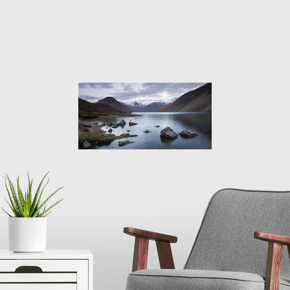 A modern room featuring Snow dusted mountains beside Wastwater in the Lake District National Park, Cumbria, England. Autu...
