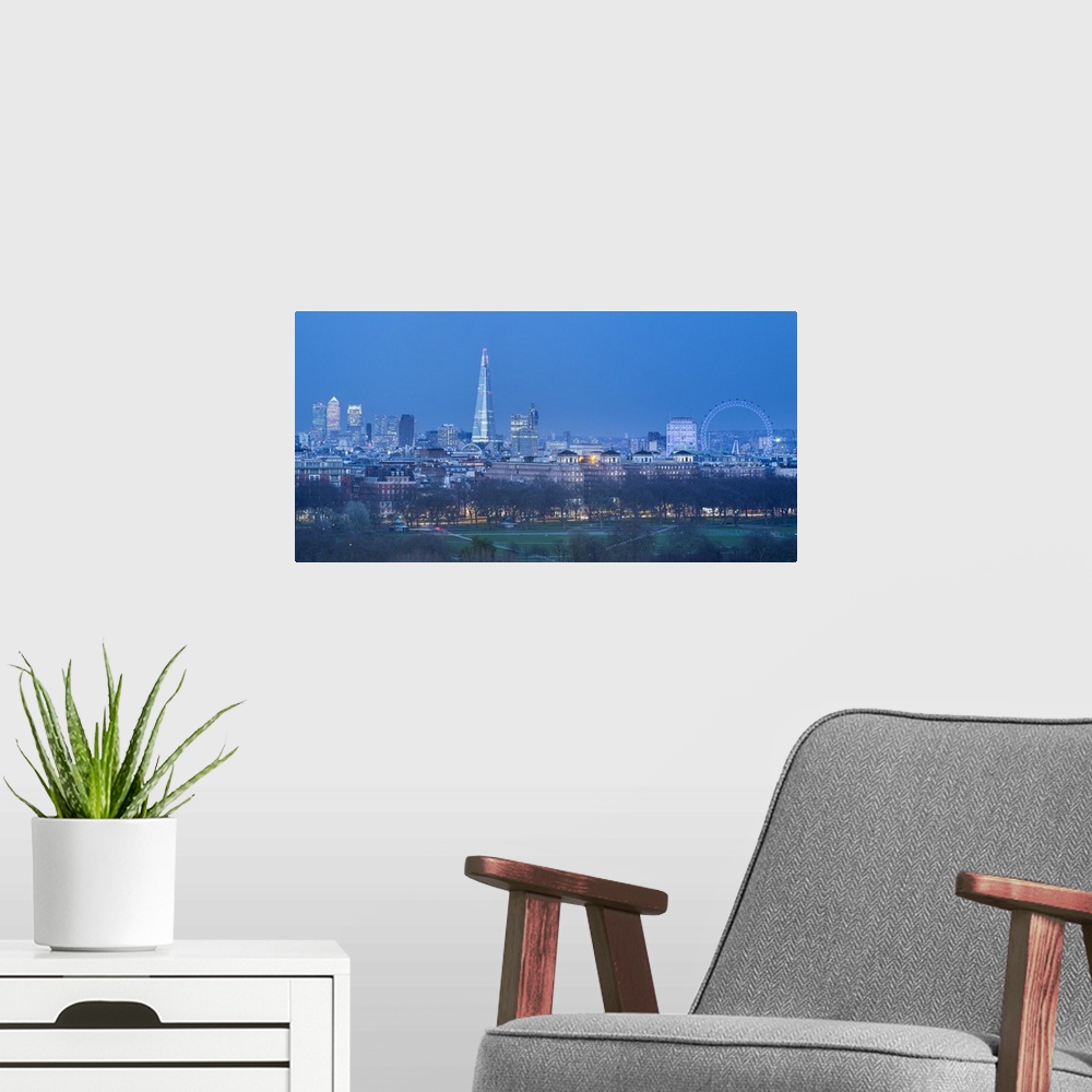 A modern room featuring The Shard, Canary Wharf and London Eye above Hyde Park, London, England, UK