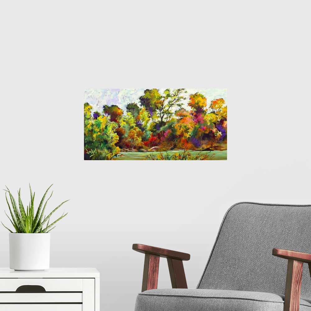 A modern room featuring Contemporary painting of a scenic view of a forest in mid color change from the seasons changing.