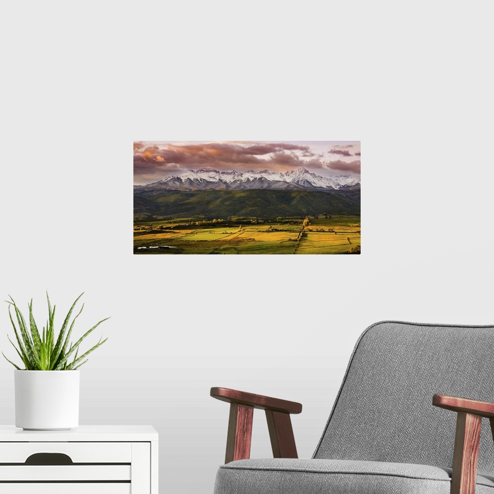 A modern room featuring Snowcapped Mountains Overlook Valley at Sunset, Telluride, Colorado