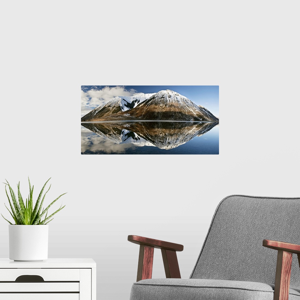 A modern room featuring Mountains reflecting in Lake Pearson in winter, Castle Hill Basin, Canterbury, New Zealand