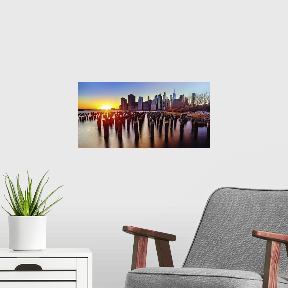 A modern room featuring Lower Manhattan Sunset Viewed from Brooklyn, New York City, USA.