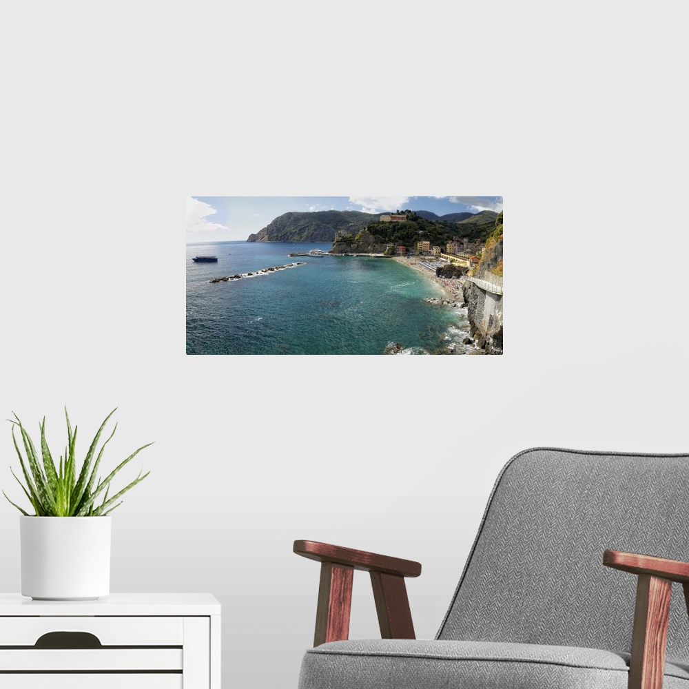 A modern room featuring Panoramic High Angle view of a Coastal Town, Monterosso Al Mare, Cinque terre, Liguria, Italy.