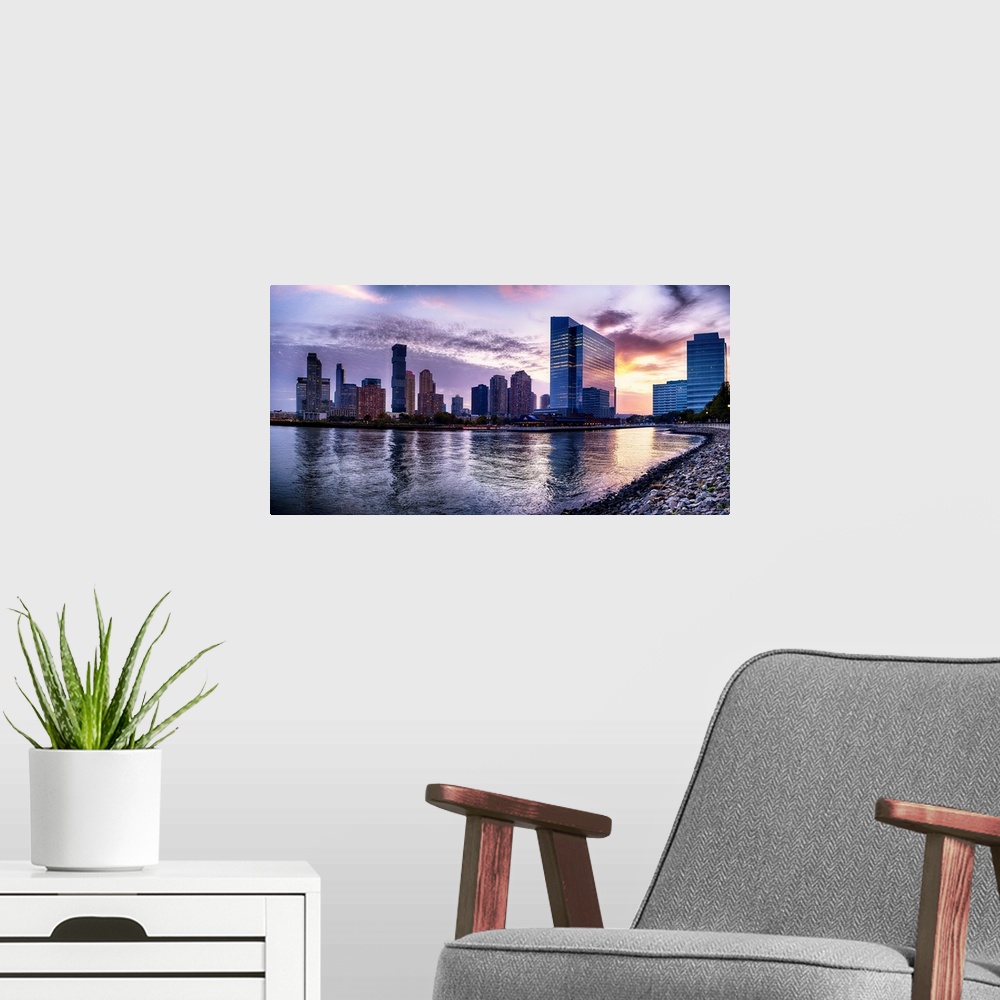 A modern room featuring Low Angle Panroramic View of The Newport Waterfront, Jersey City, New Jersey.