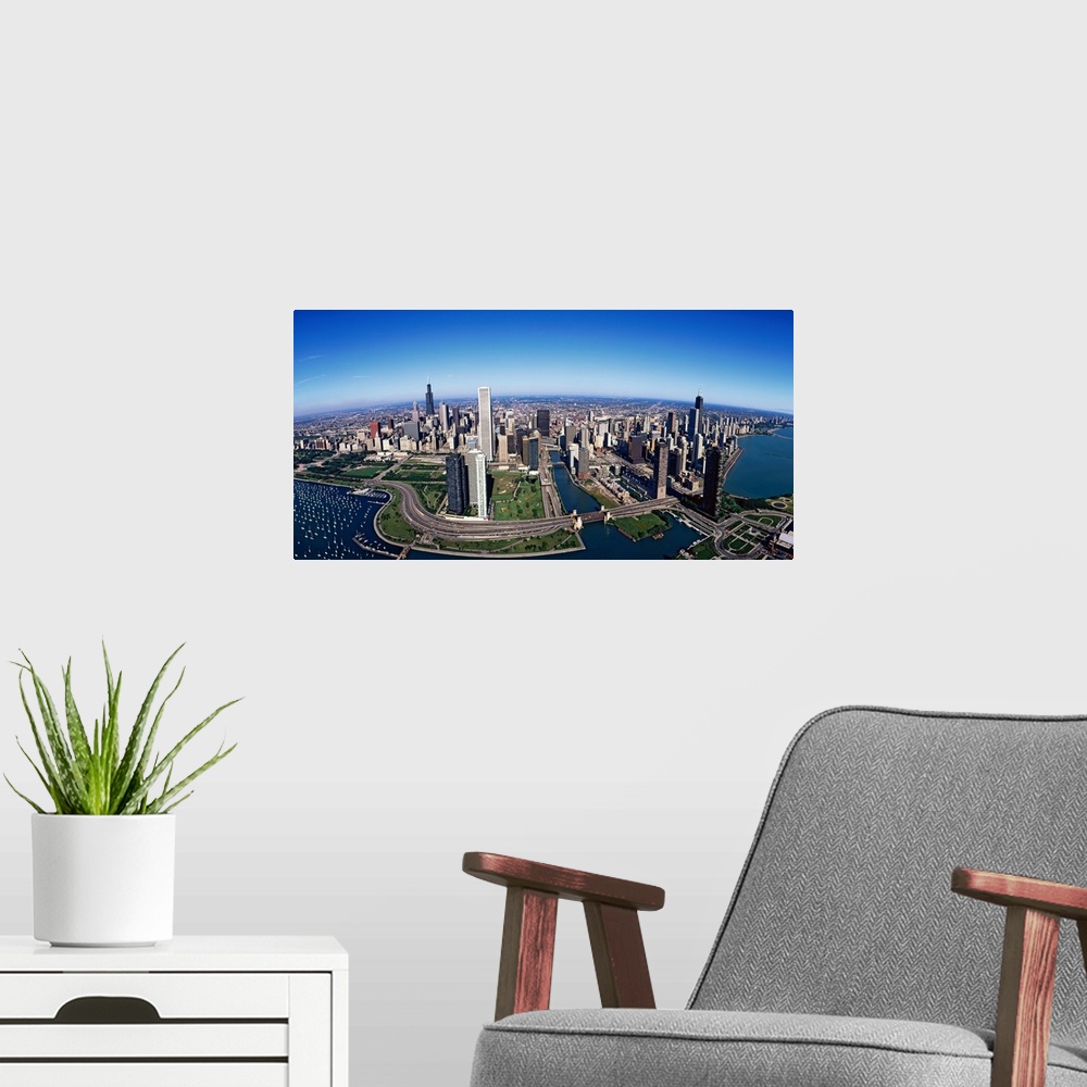 A modern room featuring Giant panoramic photo of downtown Chicago, Illinois (IL). Skyscrapers and boats in Lake Michigan ...