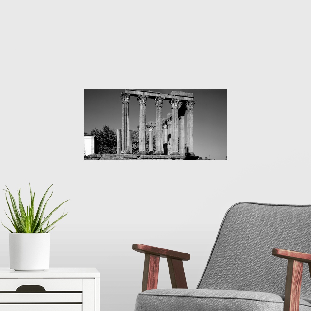 A modern room featuring Low angle view of columns in the temple, Temple Of Diana, Evora, Portugal