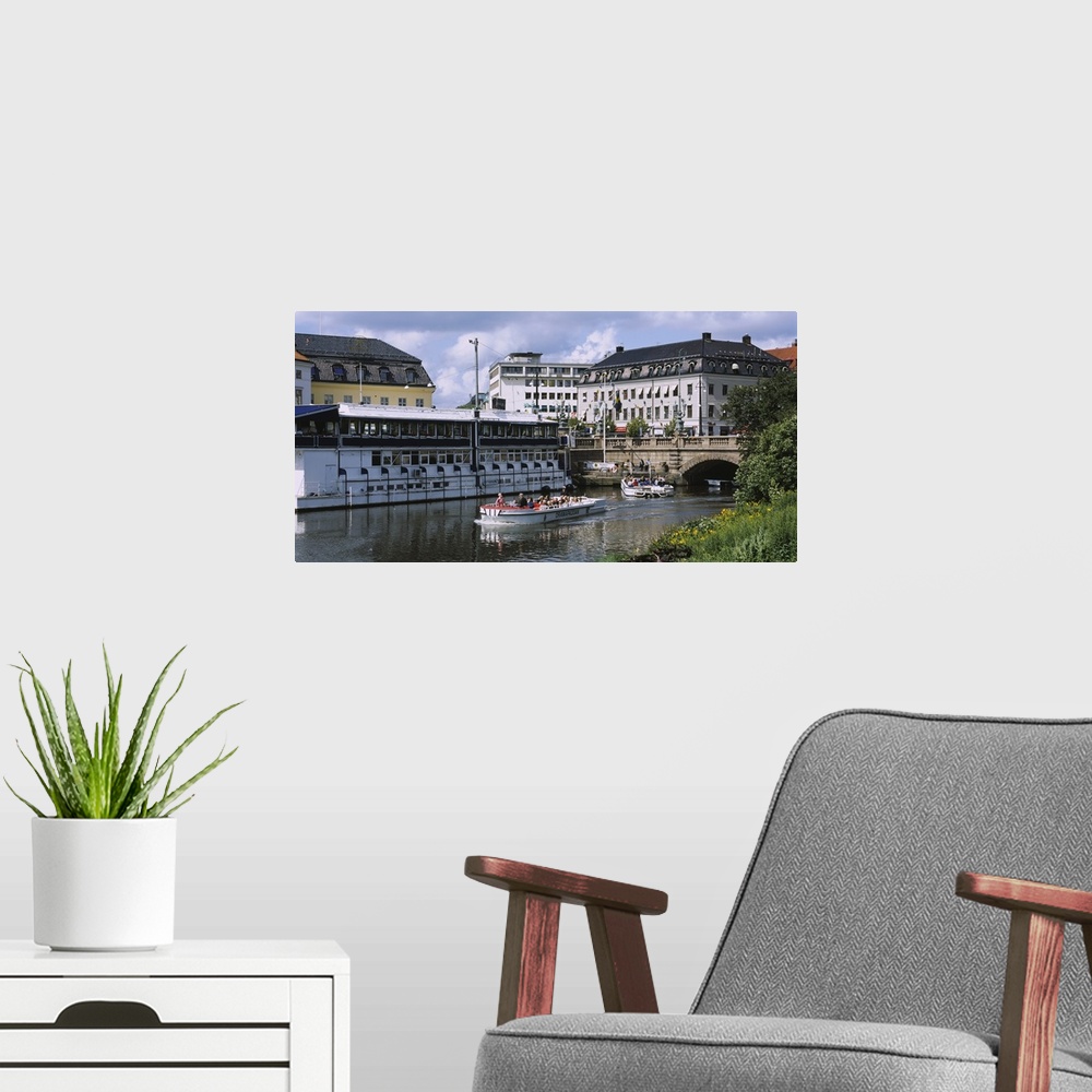 A modern room featuring Tourists on boats in a river, Vall Graven Channel, Gothenburg, Sweden