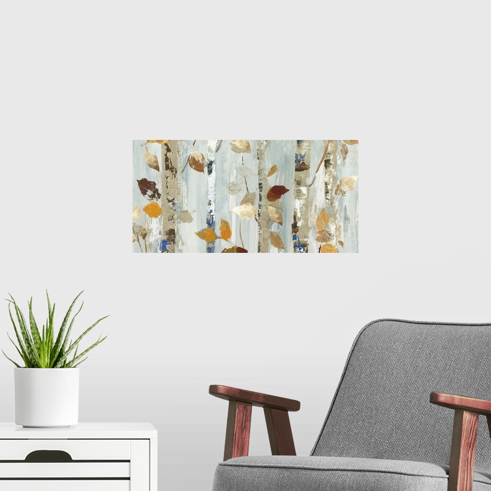 A modern room featuring Contemporary panoramic painting of a close up of trees with fall leaves in neutral tones.