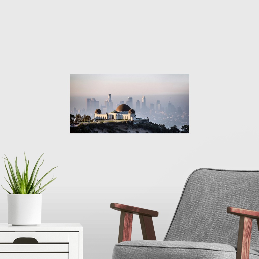 A modern room featuring Elevated view of Griffith Observatory with downtown Los Angeles in the background, California.