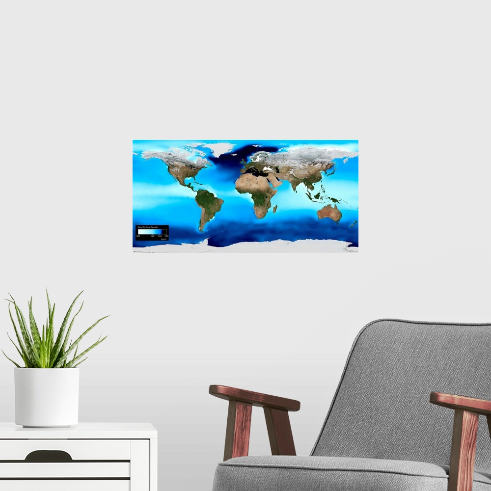 A modern room featuring Big map of the world on canvas with different shades of blue in the background representing the d...